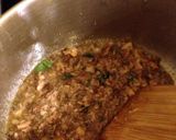 A picture of step 9 of Crostini di Pesce/ Sardine and anchovy garlicky appetizer.