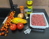 Une image de l'étape 1 de Tomates et courgettes farcies à la poêle.