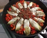 Une image de l'étape 9 de Flan d'endives caramélisées aux tomates, poivron, jambon cru et fromage frais.
