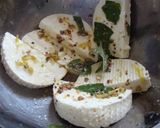 A picture of step 6 of Lemon and Herb Seasoned Cheese.