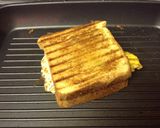A picture of step 13 of Grilled Sausage Fried Egg And Cheese.