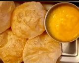 A picture of step 3 of Aam ras with puri.