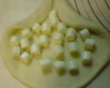 A picture of step 3 of Big Cheese Bread Full of Cheese.