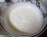 A picture of step 4 of Rich and Smooth Strawberry and Fresh Cheese Ice Cream.