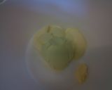 A picture of step 4 of Polenta & Strawberry Cup Cakes. Super Moist & Yummy.