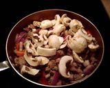 A picture of step 4 of Mom's Sausage and Mushroom Casserole.