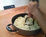 A picture of step 2 of Causa Limeña (salmon).
