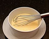 A picture of step 1 of Orange Cream Popsicles.