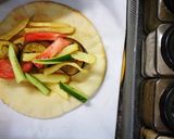 A picture of step 5 of Falafel sandwich||Falafel wrap.
