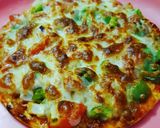 A picture of step 7 of Cheese burst pizza.