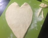 A picture of step 10 of Heart Shaped Pizza.