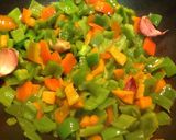 Foto del paso 2 de la receta Wok de garbanzos con pimientos y cebolla