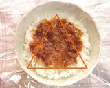 A picture of step 3 of Rice Balls with Umeboshi and Bonito Flakes.