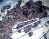 A picture of step 4 of Sig's Banana,Chocolate-Walnut Loaf with Banana Cream Cheese Fro.