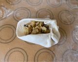 A picture of step 13 of Chinese steamed vegetable buns.