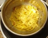 A picture of step 11 of Tomato Carbonara With Plenty Of Bacon.
