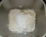 A picture of step 1 of Basic Bread Dough Using a Bread Machine.