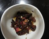 A picture of step 4 of Amla Candy in microwave.