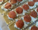 A picture of step 5 of Pepperoni Pizza Lasagna Rolls.