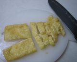 A picture of step 2 of Boiled Mizuna Greens and Fried Tofu.