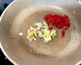 A picture of step 7 of Asian Chilli & Garlic king prawns in a stir fry Sauce. 🥰.