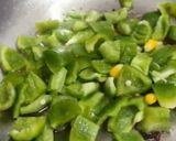 A picture of step 2 of Corn capsicum paneer masala.
