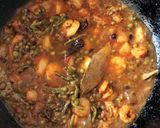 A picture of step 5 of Chingri Pui Metuli (Malabar Spinach Seeds Curry with Prawns).