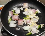 A picture of step 2 of Walnut Schezwan Stir Fry.
