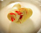 Foto del paso 5 de la receta: Cuernitos de mortadela y ajo