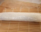 A picture of step 9 of California Rolls with Salmon and Cream Cheese.