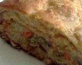 A picture of step 10 of Brat, veggie, & cheese stuffed butter tastin' grands flaky layers pilsbury biscuit pie!.