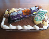 A picture of step 5 of Cookie Ice Cream Cake Decorated For a Birthday.