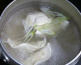A picture of step 3 of Easy Egg Drop Gyoza Soup.