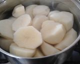 A picture of step 1 of My Garlic Roast Potatoes and Garlic Flavoured Gravy 😉.