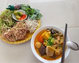 A picture of step 7 of Bún Riêu Cua (Vietnamese Crab Noodle Soup).