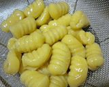 A picture of step 8 of Sweet Potato Gnocchi with Garlic and Butter Sauce.
