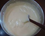 A picture of step 4 of Rich Black Sesame Roll Cake.