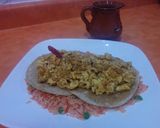 A picture of step 7 of Scrambled rancheros' eggs over rice.