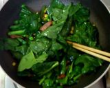 A picture of step 5 of Butter-Sautéed Spinach with Caramelized Soy Sauce.