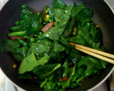 A picture of step 5 of Butter-Sautéed Spinach with Caramelized Soy Sauce.