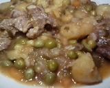 A picture of step 5 of Matoke with beef and peas.