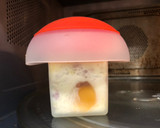 Foto del paso 7 de la receta: Huevos con jamón serrano y queso en estuches Ovo Lékué al microondas