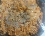 A picture of step 6 of Chicken fettuccine creamy pink pasta.