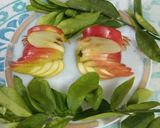 A picture of step 7 of Chickpea fruits veggies and nuts salad.