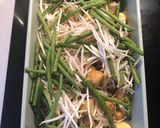 A picture of step 3 of Charlotte potato, green bean and bean sprout tray bake with peanut, coconut and chilli dressing.