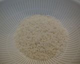 A picture of step 3 of Rice with Maitake Mushrooms Seasoned with Simmered Pork Belly Sauce.