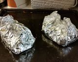 A picture of step 4 of Oven baked fish packages.
