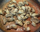 A picture of step 5 of Oil-Marinated Oysters.