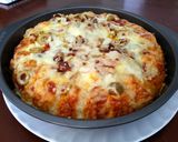 A picture of step 6 of Chicago Style Deep Dish Pull Apart Pizza.