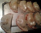 A picture of step 8 of apple and chocolate empanadas.